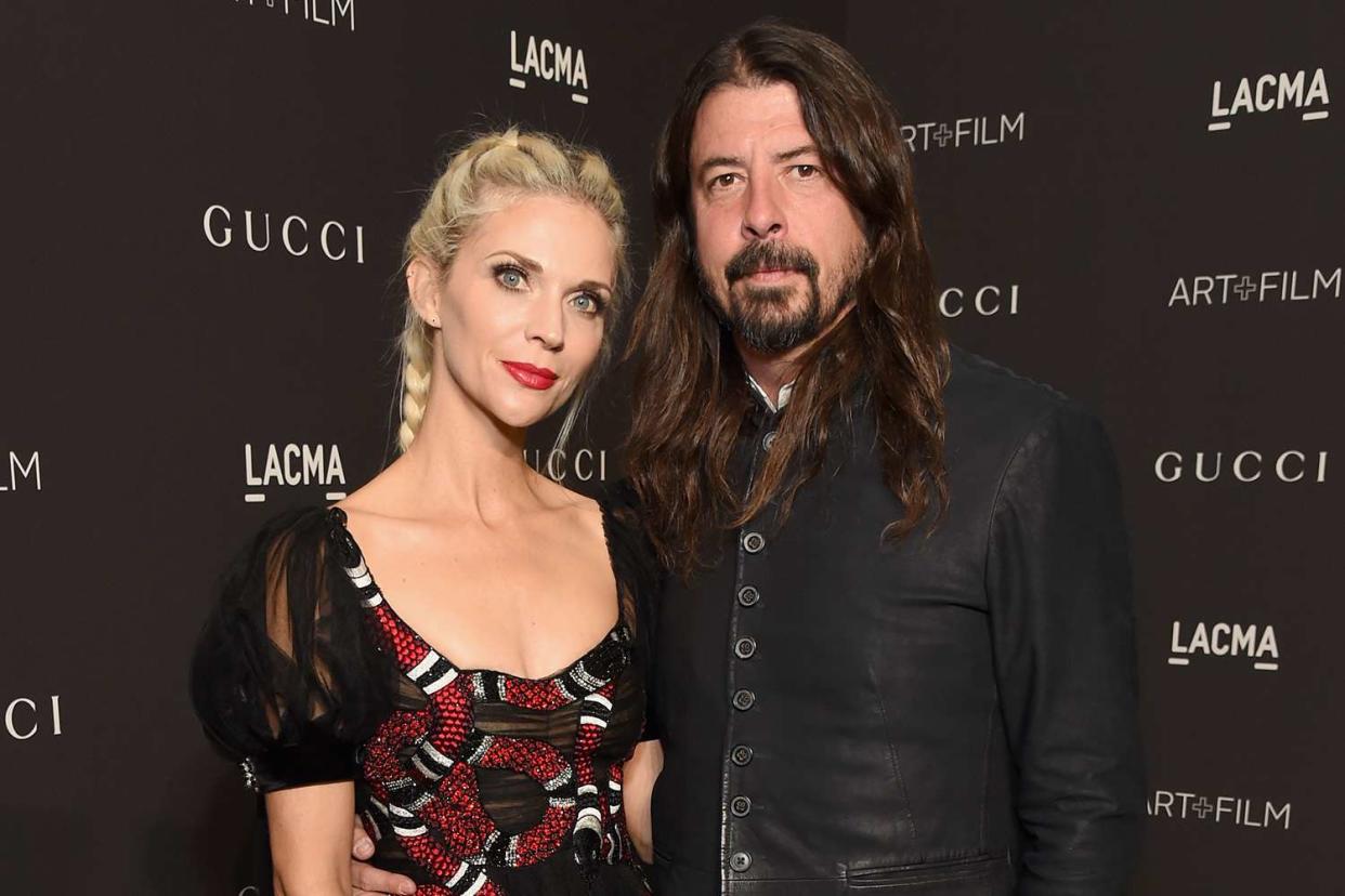 <p>Michael Kovac/Getty</p> Jordyn Blum and husband Dave Grohl in L.A. in November 2018