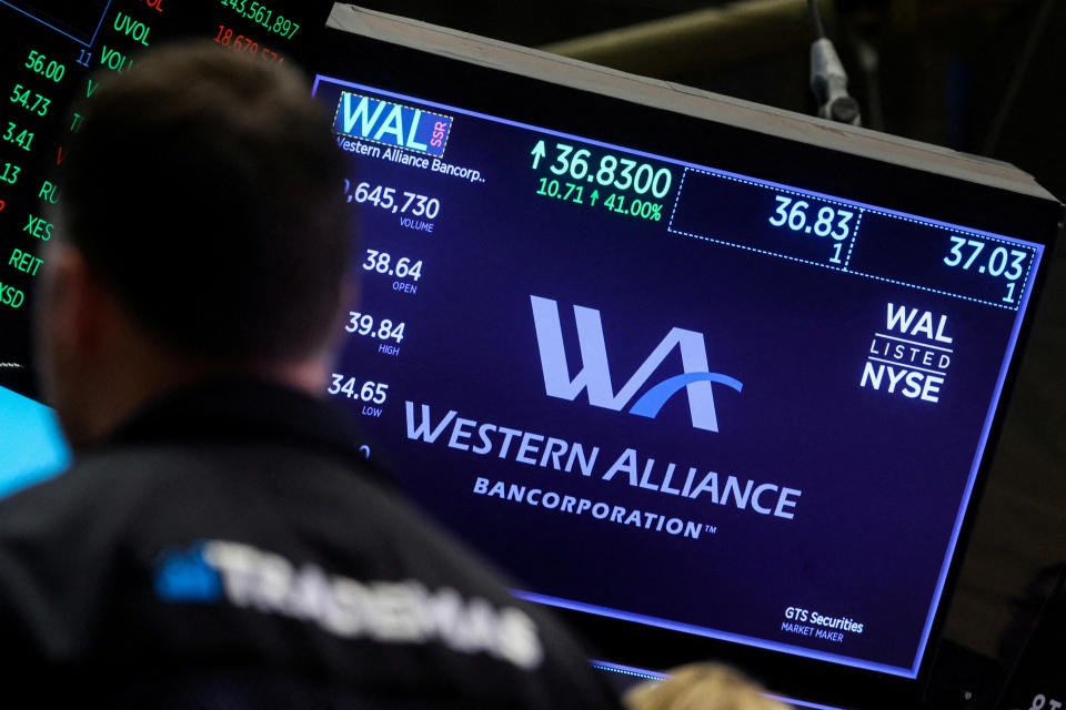 A screen displays the logo and trading info for Western Alliance Bancorporation on the floor of the New York Stock Exchange (NYSE) in New York City, U.S., March 14, 2023.  REUTERS/Brendan McDermid