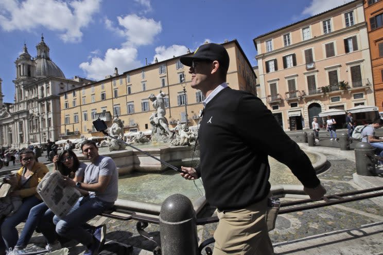 Jim Harbaugh already took his Michigan team to Italy. Now the team has other European destinations in mind. (AP Photo/Alessandra Tarantino)