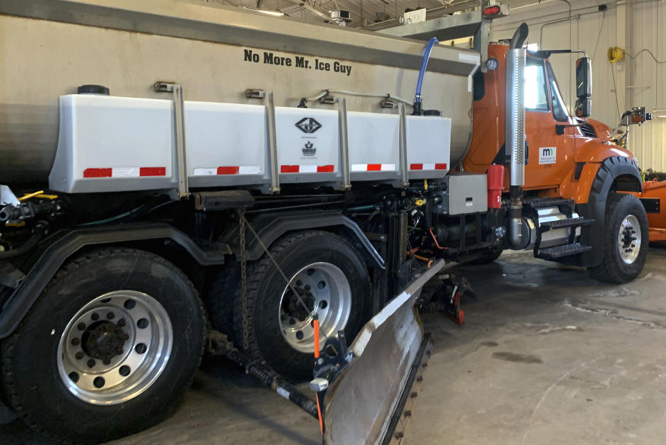 This image provided by the Minnesota Department of Transportation shows No More Mr. Ice Guy in Duluth, Minn. Snowplows are essential to enduring winter in Minnesota, so maybe it's not surprising that every year thousands of people vote on names for the giant machines — everything from Plowy McPlowFace to Darth Blader. The often-icy state began naming its 800 plows in 2020 and will announce winners of its 2023-2024 Name a Snowplow contest next week, adding eight selections to more than three dozen names that already grace trucks already rumbling down the state's roads. (Minnesota Department of Transportation via AP)