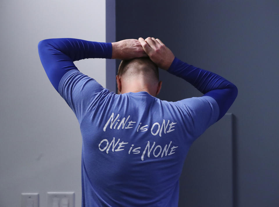 Los Angeles Dodgers' Freddie Freeman, formerly of the Atlanta Braves, takes a moment to compose himself after becoming emotional during a pregame baseball news conference before taking on his former team, Friday, June 24, 2022, in Atlanta. (Curtis Compton/Atlanta Journal-Constitution via AP)