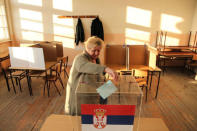 A woman casts her vote at a polling station during Serbian presidential election in the ethnically divided town of Mitrovica, Kosovo April 2, 2017. REUTERS/Agron Beqiri