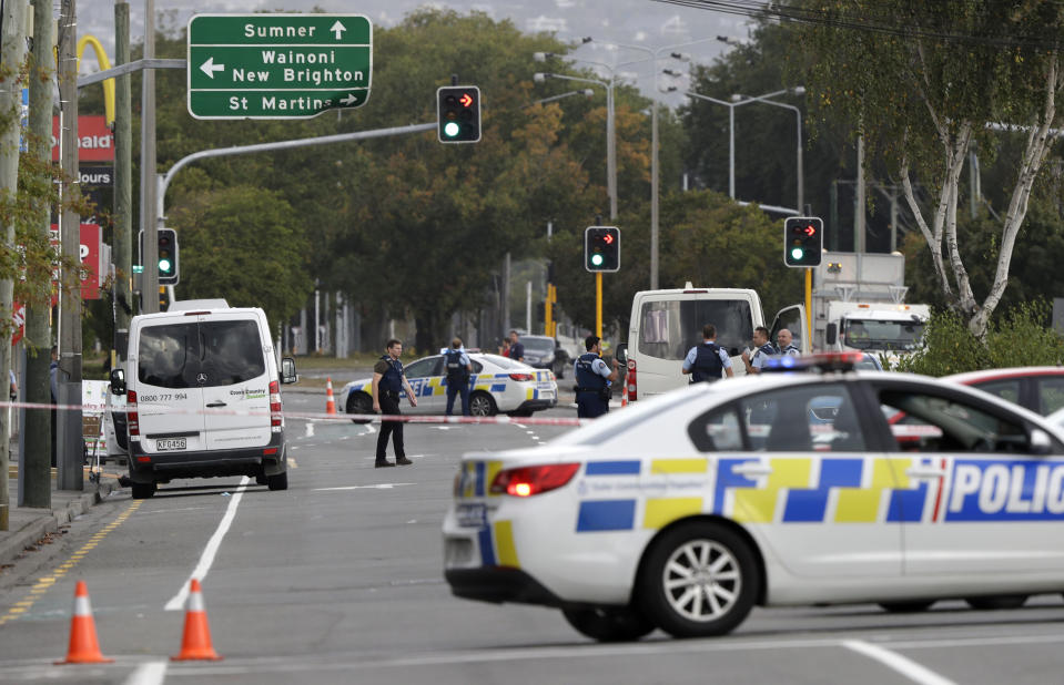 Police block the road near the shooting at a mosque in Linwood, Christchurch, New Zealand, Friday, March 15, 2019. Multiple people were killed during shootings at two mosques full of people attending Friday prayers. (AP Photo/Mark Baker)