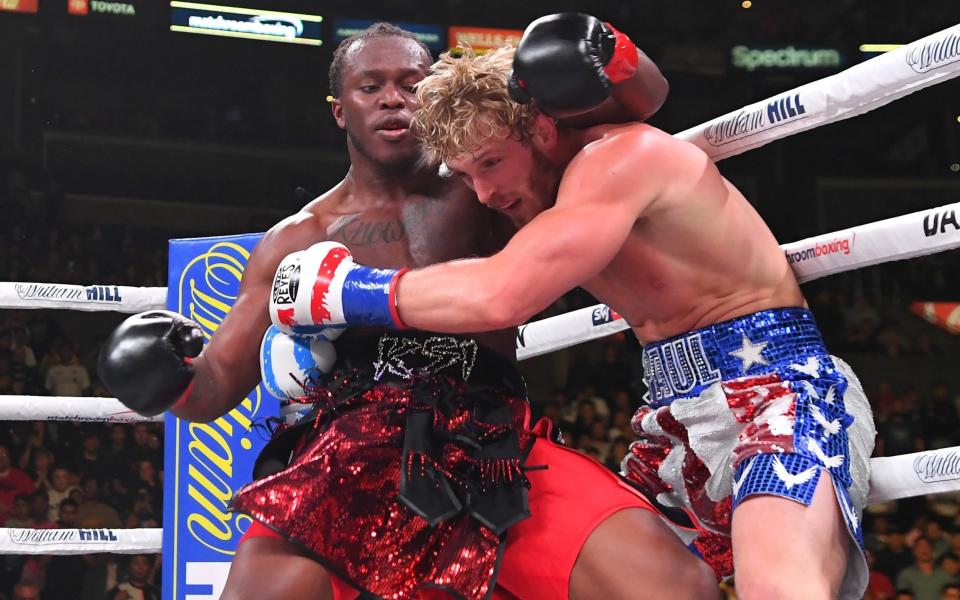 Logan Paul (right) and KSI exchange punches at Staples Center in November 2019 in Los Angeles - Jayne Kamin-Oncea/Getty Images