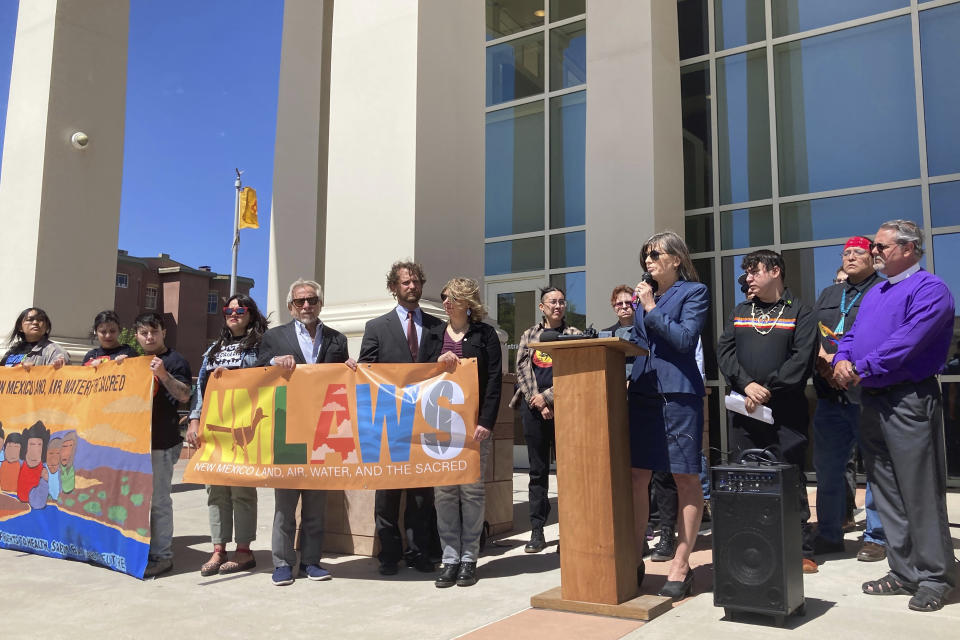 Attorney Gail Evans, of the Center for Biological Diversity's Climate Law Institute, speaks about pollution from oil and natural gas development and frustration with state oversight of the industry outside the state First District Court in Santa Fe, N.M., on Wednesday, May 10, 2023. The nation's No. 2 oil-producing state is being sued on allegations that it failed to meet constitutional provisions meant to protect against pollution from the industry. Plaintiffs include Native American residents of oil-producing regions of New Mexico. (AP Photo/Morgan Lee)