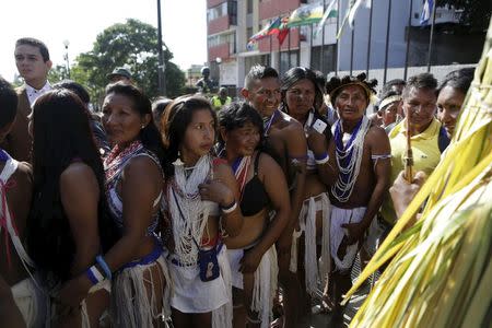 Venezuelan Indians from the Amazon tribes attend a gathering in support of the deputies of the Venezuelan coalition of opposition parties (MUD) at the Supreme Court in Caracas January 13, 2016. REUTERS/Marco Bello