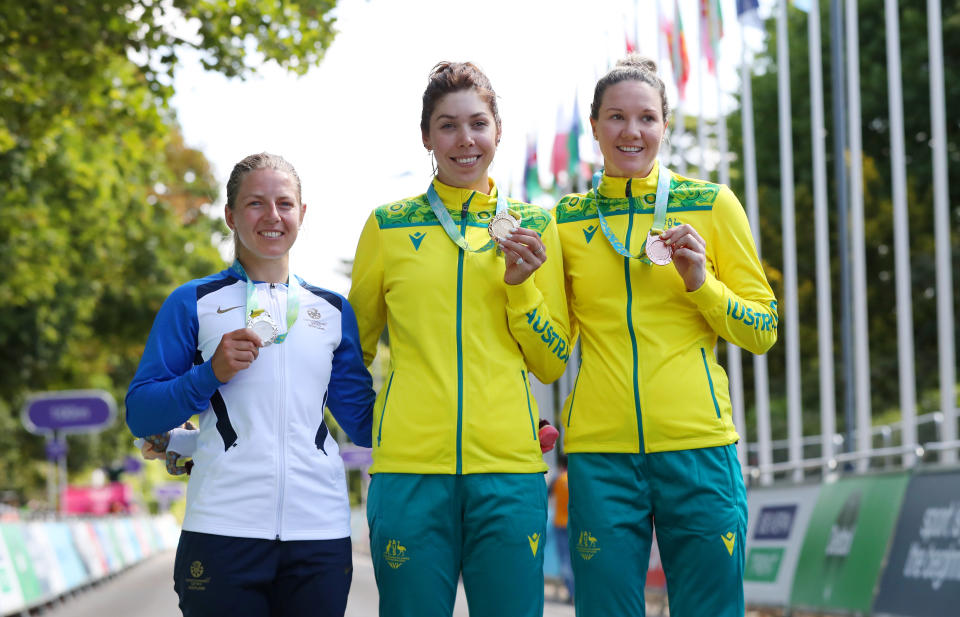 Neah Evans, Georgia Baker and Sarah Roy, pictured here with their medals after the women's road race at the Commonwealth Games.