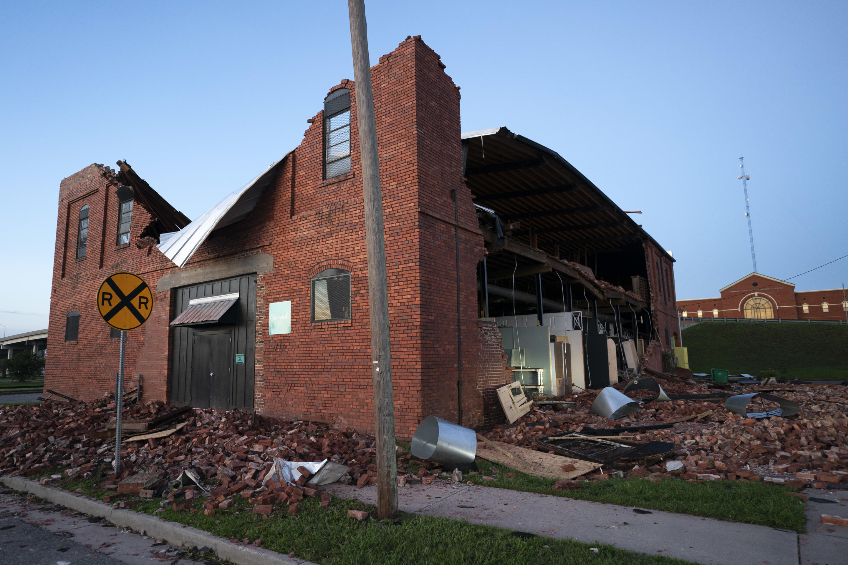 An exterior view of the rubble and remains of a brick building in Valdosta, Georgia.