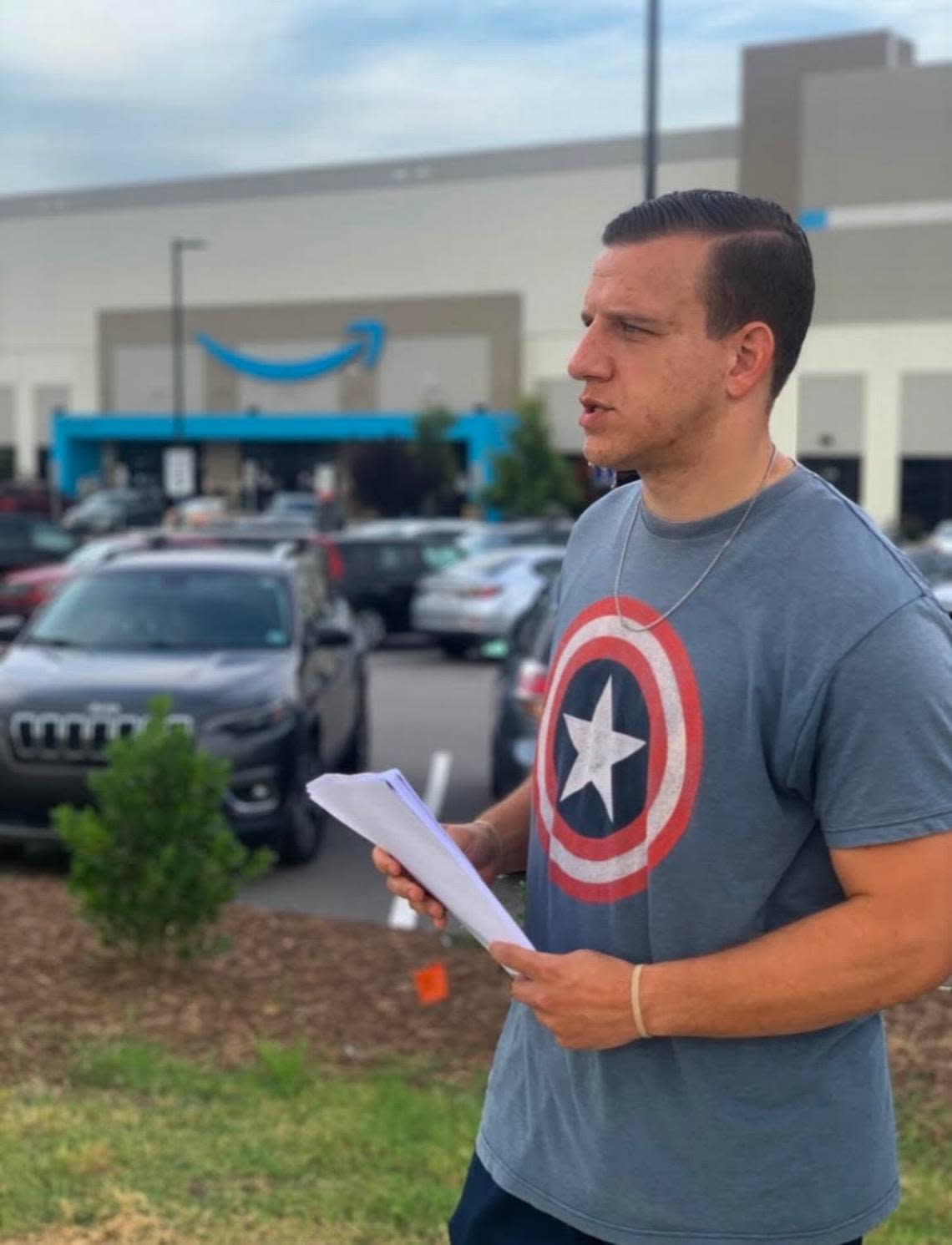 C.A.U.S.E. treasurer Tim Platt leads organizing effort outside Amazon RDU1 facility in Garner, North Carolina.