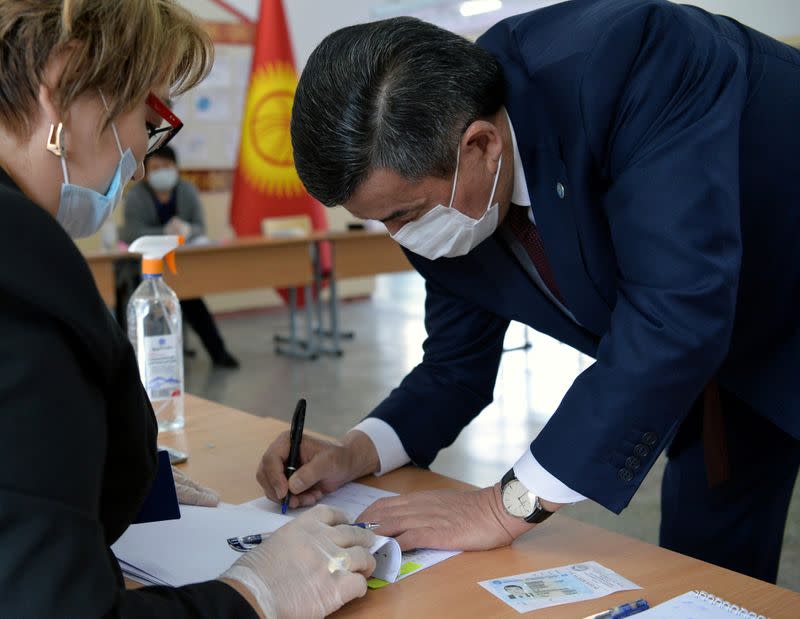 Kyrgyzstan's President Sooronbay Jeenbekov votes at parliamentary election in Bishkek