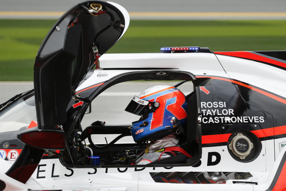 ACURA Team Penske driver Ricky Taylor waits to take the track in the pits during practice for the Rolex 24 hour auto race at the Daytona International Speedway, in Daytona Beach Fla., on Thursday, Jan. 23, 2020. (AP Photo/Reinhold Matay)