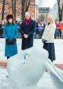 Kate, William and Princess Mette-Marit of Norway check out a snow sculpture in Oslo during their 2018 visit.