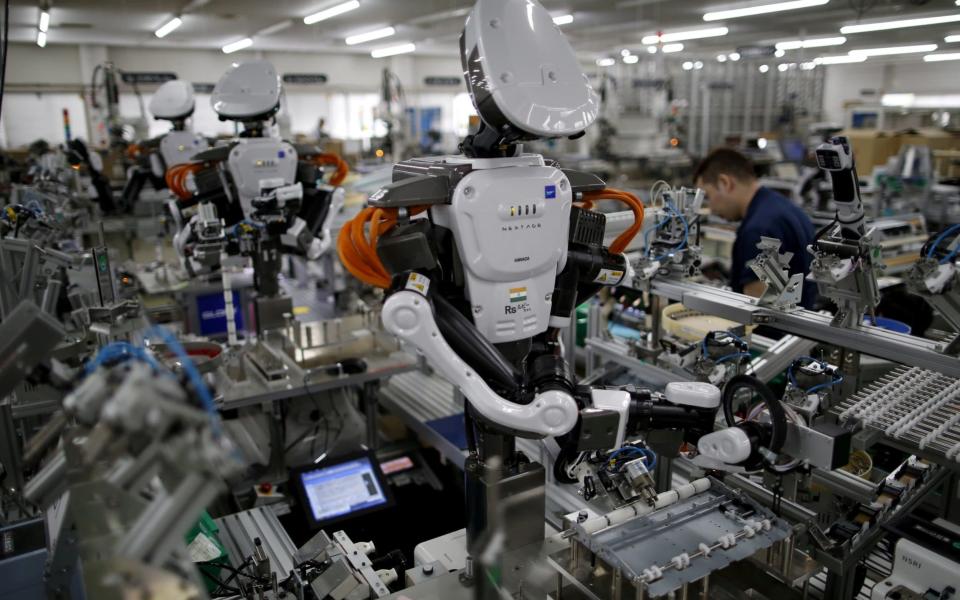 Robots could take hundreds of millions of jobs around the world by 2030 - but they should create plenty of new roles for humans too - REUTERS