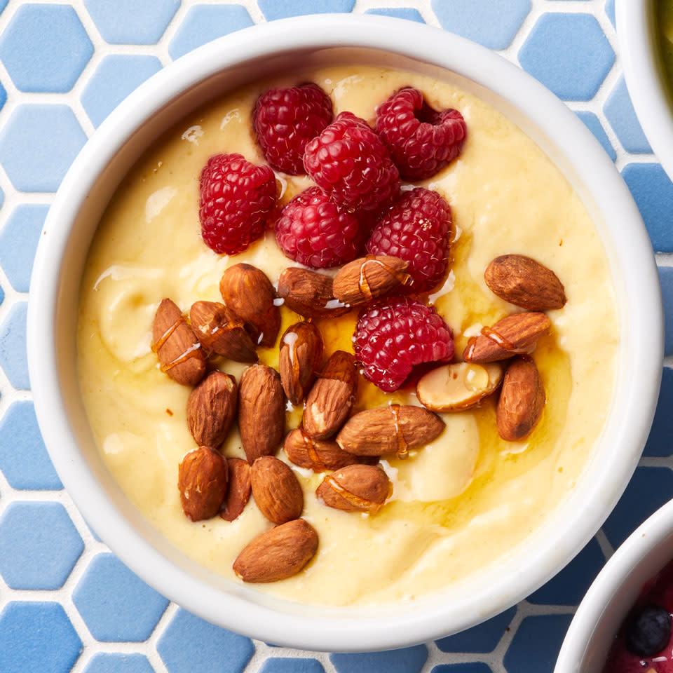 <p>For this healthy smoothie bowl recipe, be sure to use frozen fruit (not fresh) to keep the texture thick, creamy and frosty.</p> <p> <a href="https://www.eatingwell.com/recipe/259663/mango-almond-smoothie-bowl/" rel="nofollow noopener" target="_blank" data-ylk="slk:View Recipe" class="link ">View Recipe</a></p>