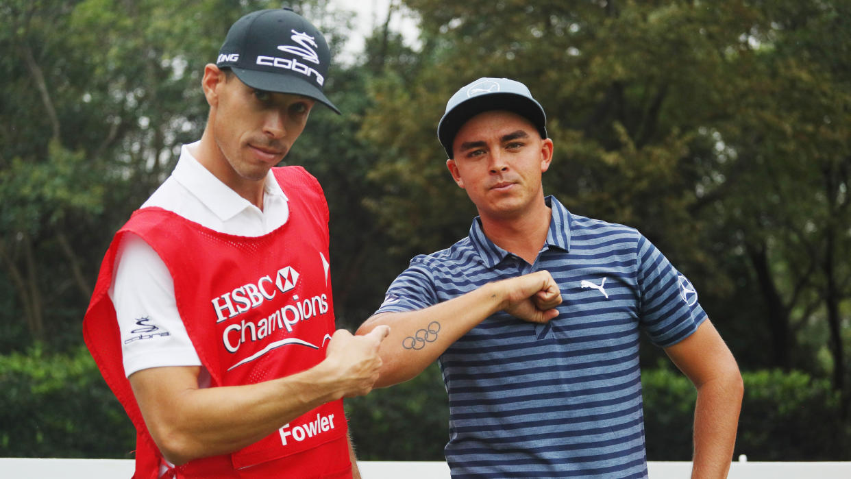  Joe Skovron, caddie for Rickie Fowler of the United States, points to his Olympic Rings tattoo during a practice round prior to the start of the WGC - HSBC Champions at the Sheshan International Golf Club on October 26, 2016 