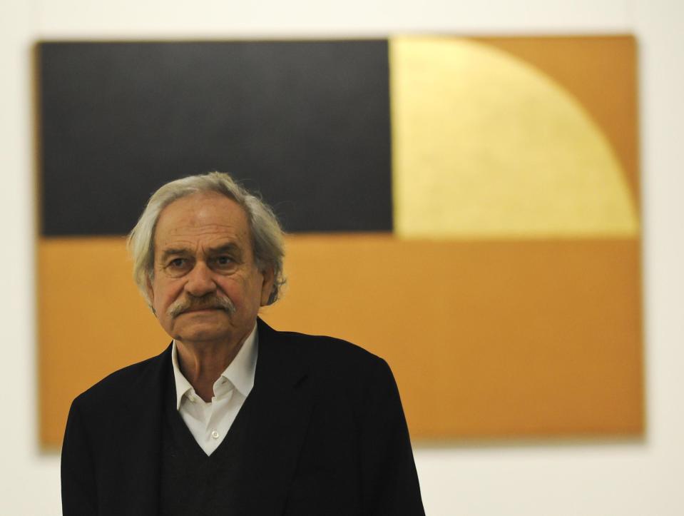 FILE -- In this March 11 2015 file photo Jannis Kounellis poses for pictures in Citta' di Castello, Italy. Greek artist Jannis Kounellis, a major exponent of Arte Povera who made Italy his adopted home, has died in Rome at the age of 80. (Crocchioni/ANSA via AP)