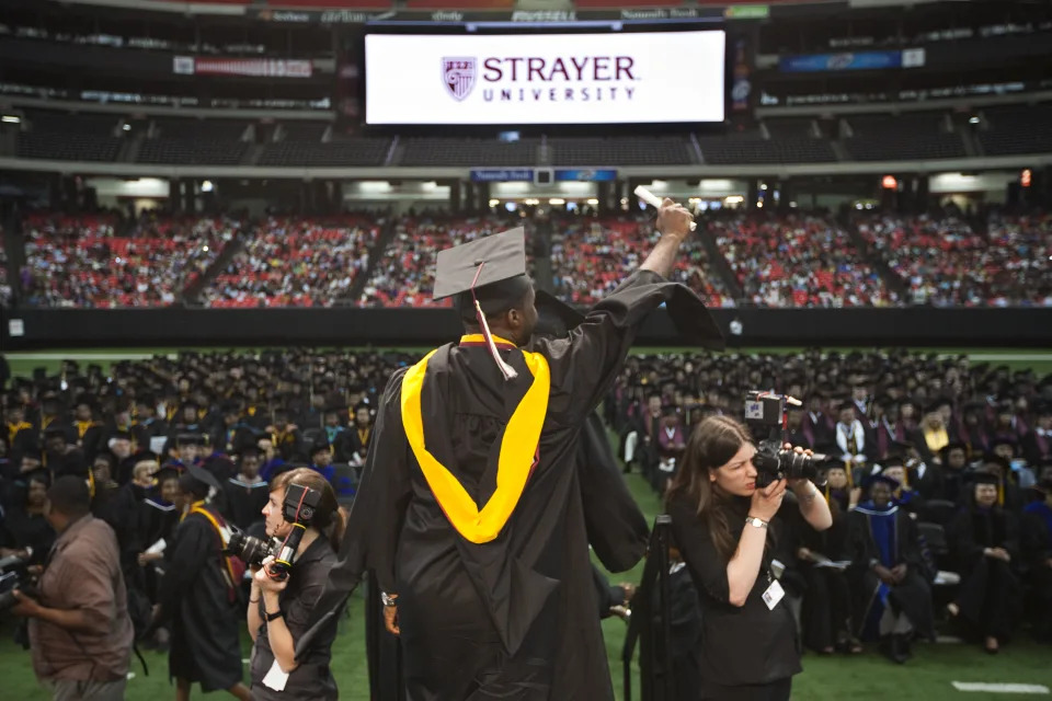 A commencement ceremony for Strayer University,  a private, for-profit educational institution.   Strayer University specializes in higher education for working adults seeking career advancement. (Photo by Brooks Kraft LLC/Corbis via Getty Images)