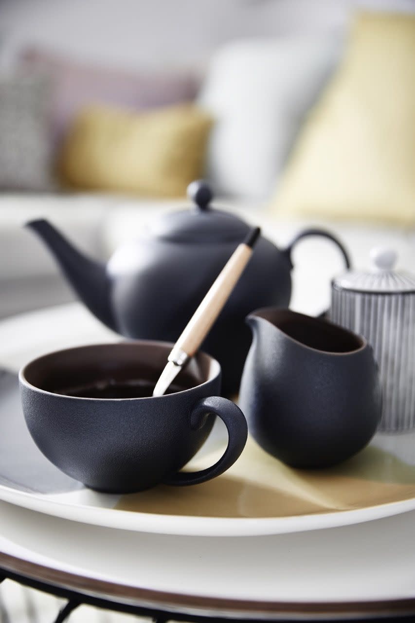 tea detail, teapot, cupsuse the new neutral tones of grey and black offset with lemon accents in a space saving scheme that soothes the soul