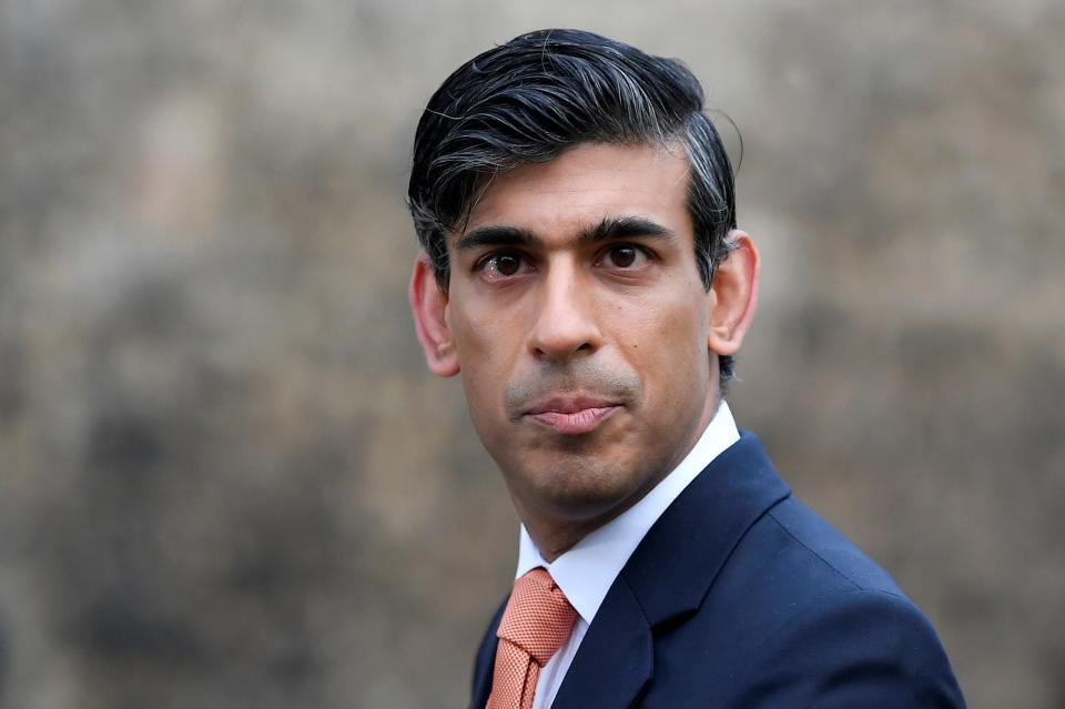 Britain's Chancellor of the Exchequer Rishi Sunak looks on as he leaves following an outside broadcast interview, in London, Britain, November 26, 2020. REUTERS/Toby Melville