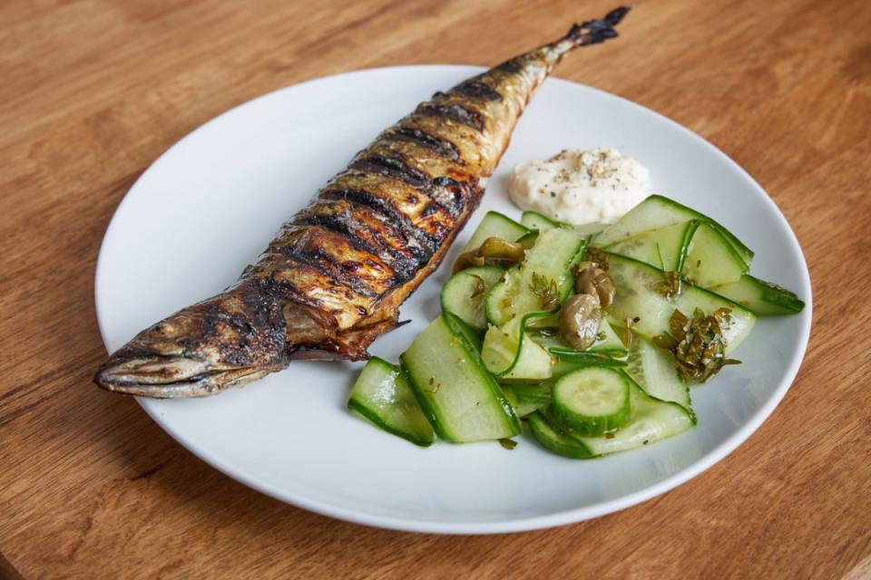 Lizard-brain appeal: the vigorously charred whole mackerel with Japanese cucumber salad (Matt Writtle)