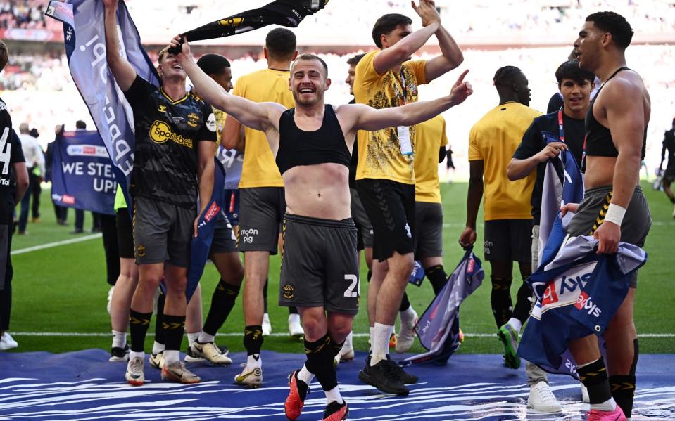 Southampton's Che Adams and Ryan Fraser celebrate after winning the Championship Play-Off final