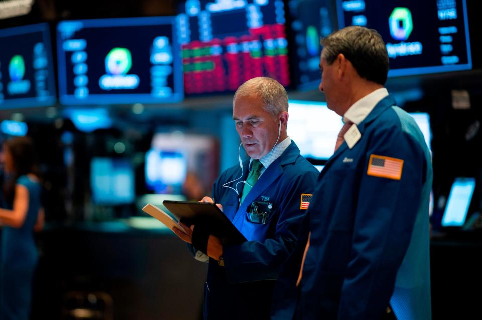 Traders get to work after the opening bell at the New York Stock Exchange.