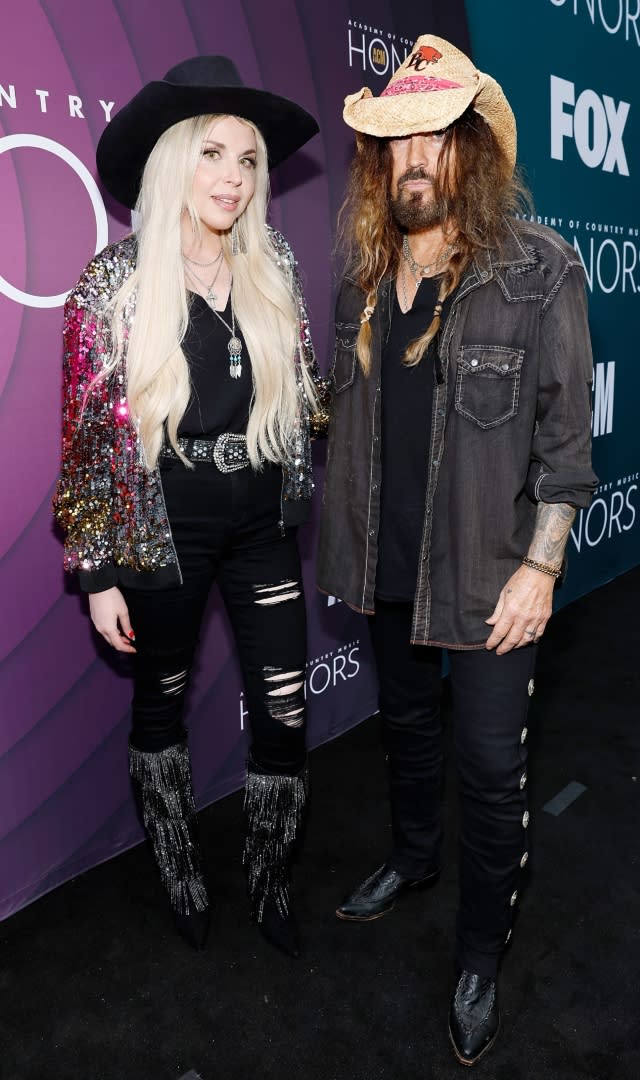 NASHVILLE, TENNESSEE – AUGUST 23: (L-R) FIREROSE and Billy Ray Cyrus attend the 16th Annual Academy of Country Music Honors at Ryman Auditorium on August 23, 2023 in Nashville, Tennessee. <em>Photo by Jason Kempin/Getty Images for ACM.</em>