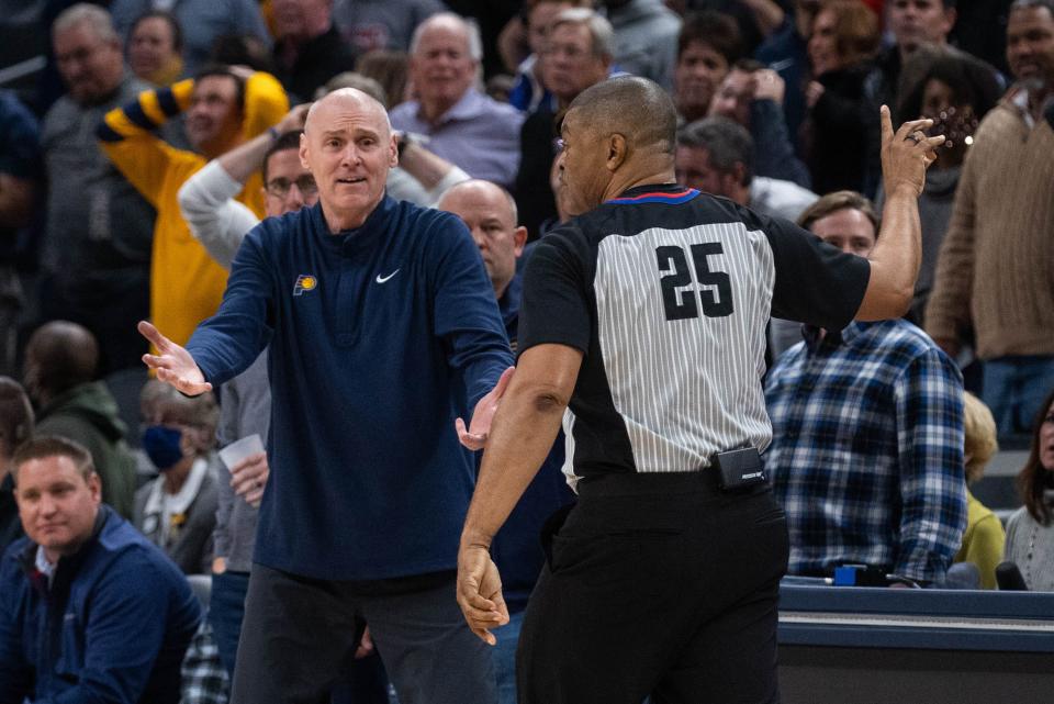 Dec 1, 2021; Indianapolis, Indiana, USA; Indiana Pacers head coach Rick Carlisle complains about a non call to referee Tony Brothers (25) in the second half against the Atlanta Hawks at Gainbridge Fieldhouse. Mandatory Credit: Trevor Ruszkowski-USA TODAY Sports