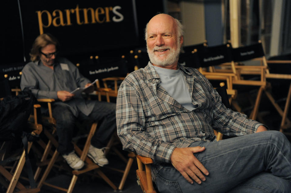 James Burrows, director of the television series "Partners," watches over the set of the show on Wednesday, Sept. 19, 2012, at Warner Bros. Studios in Burbank, Calif. Burrows isn't a household name. But behind the scenes Burrows reigns as a comedy giant. He's a director whose brand of funny business has helped shape TV comedy season after season. (Photo by Chris Pizzello/Invision/AP)