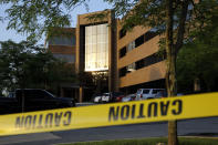 <p>Crime scene tape surrounds a building housing The Capital Gazette newspaper’s offices, Friday, June 29, 2018, in Annapolis, Md. A man armed with smoke grenades and a shotgun attacked journalists in the building Thursday, killing several people before police quickly stormed the building and arrested him, police and witnesses said. (Photo: Patrick Semansky/AP) </p>