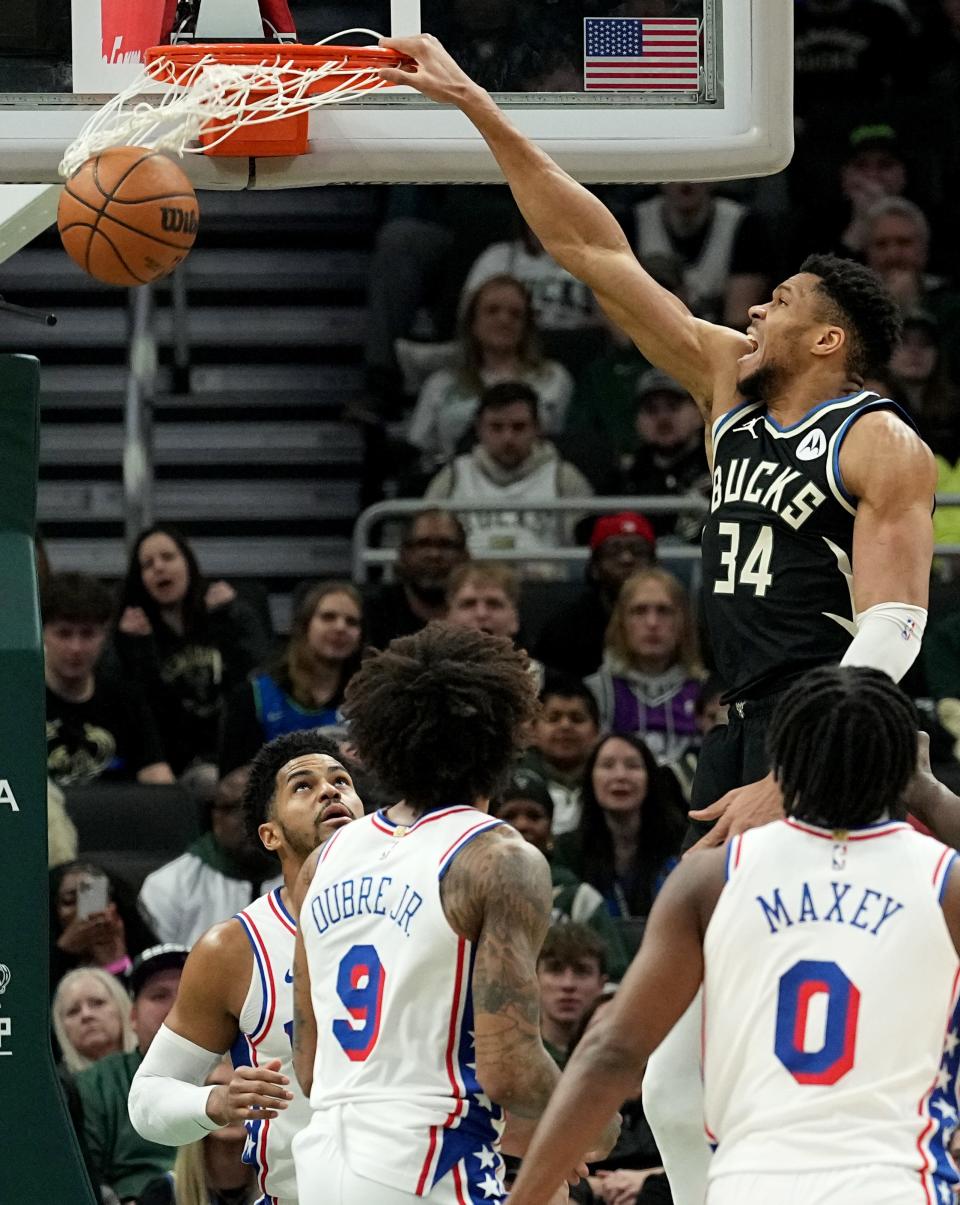 Milwaukee Bucks forward Giannis Antetokounmpo dunks against the Philadelphia 76ers on March 14 at Fiserv Forum.