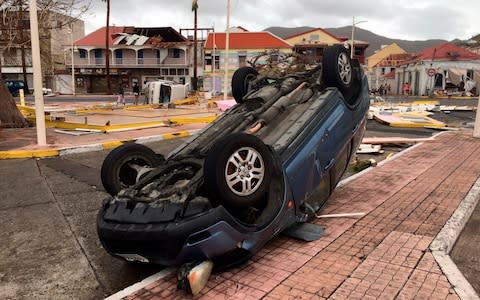 A car overturned by Saint-Martin in high-speed winds - Credit:  Splash News