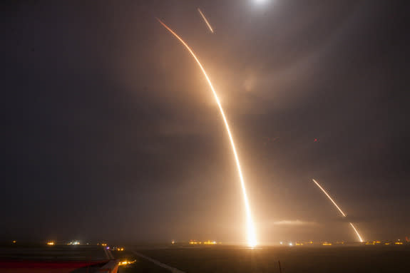 This long exposure captures the launch of SpaceX's Falcon 9 rocket and its subsequent engine burns to return to Earth during a historic flight from Cape Canaveral Air Force Station on Dec. 21, 2015.