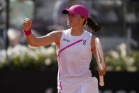 Poland's Iga Swiatek reacts after winning a point during a match against Germany's Angelique Kerber at the Italian Open tennis tournament in Rome, Monday, May 13, 2024. (AP Photo/Alessandra Tarantino)