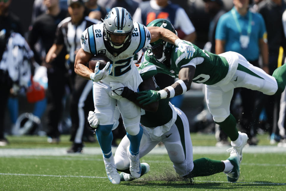 Carolina Panthers running back Christian McCaffrey runs against the New York Jets during the first half of an NFL football game Sunday, Sept. 12, 2021, in Charlotte, N.C. (AP Photo/Nell Redmond)