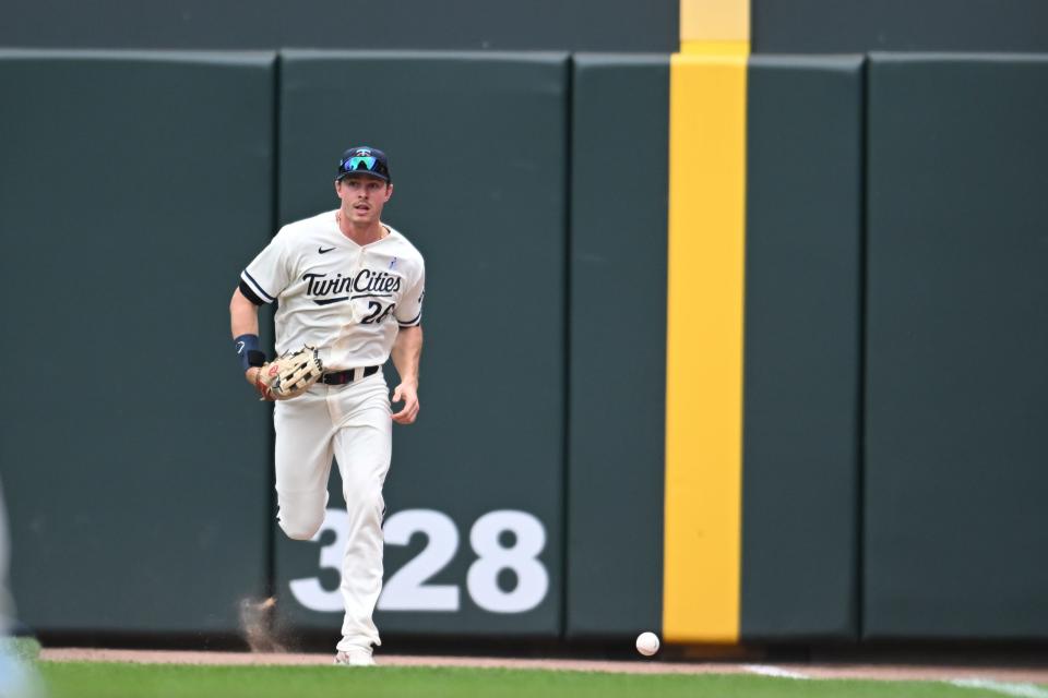 Minnesota Twins right fielder Max Kepler (26) chases the ball on an RBI triple by Detroit Tigers shortstop Javier Baez (not pictured) during the first inning at Target Field in Minneapolis on Sunday, June 18, 2023.