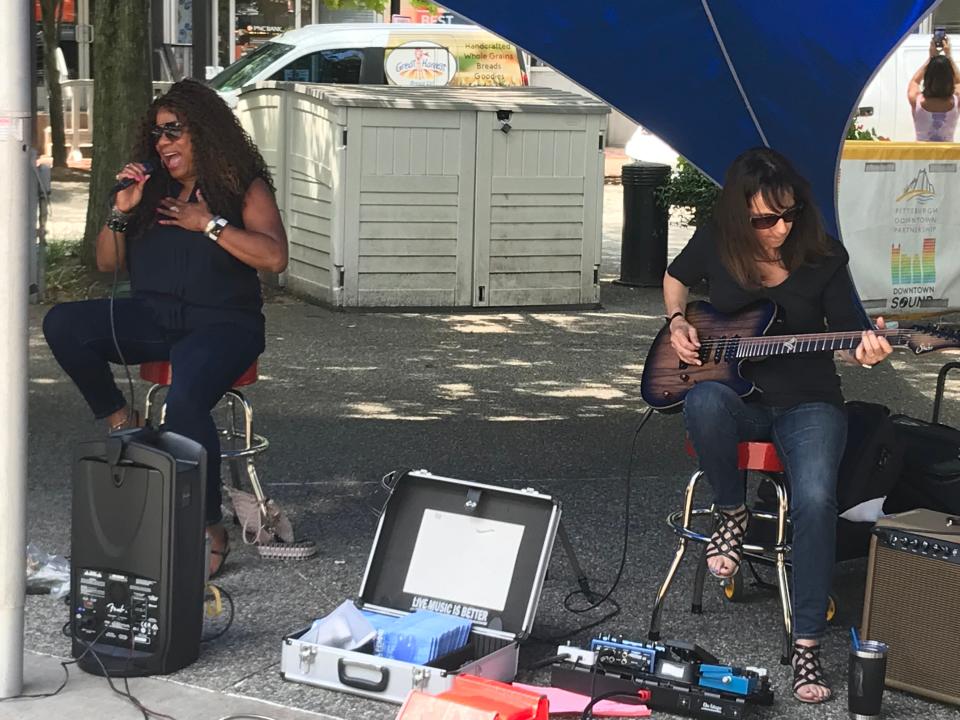 Souful Femme features Cheryl Rinovato (right) on guitar.