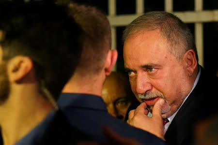 FILE PHOTO: Avigdor Lieberman, leader of Yisrael Beitenu leaves his party headquarters following the announcement of exit polls in Israel's parliamentary election, in Jerusalem