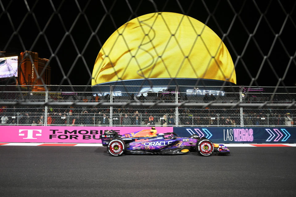 LAS VEGAS, NEVADA - NOVEMBER 19: Sergio Perez of Oracle Red Bull Racing F1 team (11) gets third place on F1 Grand Prix of Las Vegas at Las Vegas Strip Circuit as the Sphere, the spherical music and entertainment arena is seen behind in Las Vegas, Nevada, United States on November 19, 2023. (Photo by Tayfun Coskun/Anadolu via Getty Images)