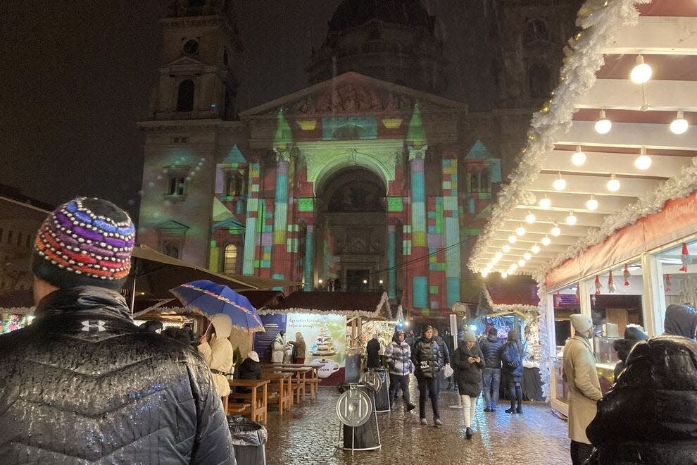 Nightly light shows project on St. Stephen's Basilica at the Budapest Christmas market