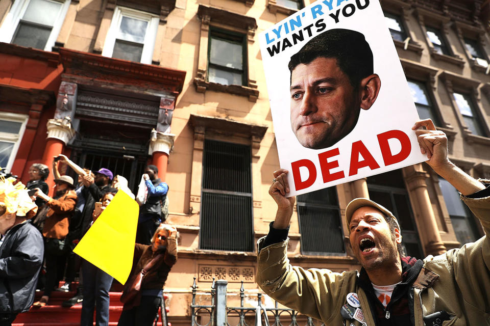 <p>Dozens of health care activists protest in front of a Harlem charter school before the expected visit of House Speaker Paul Ryan on May 9, 2017 in New York City. (Photo: Spencer Platt/Getty Images) </p>