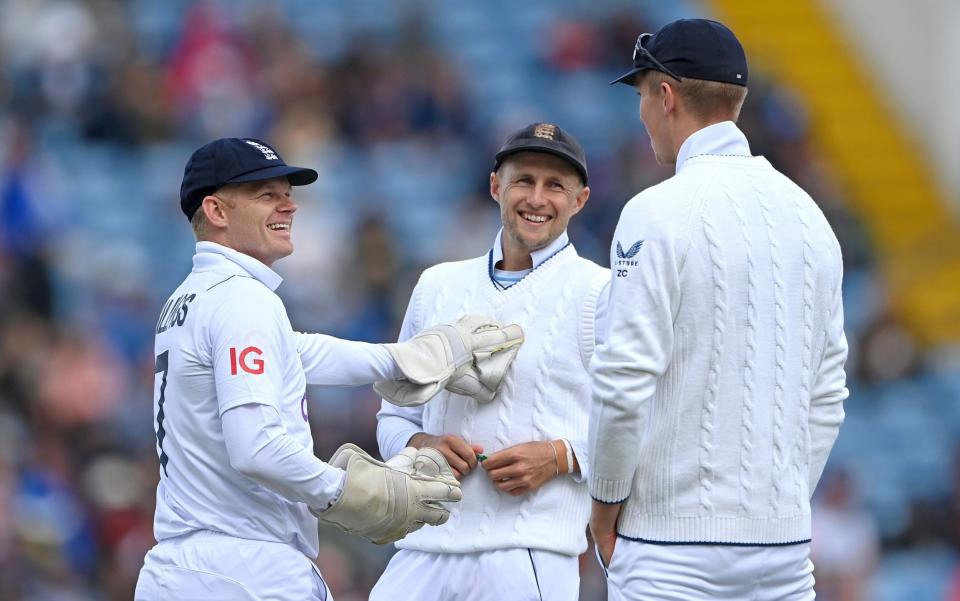 Replacement wicketkeeper Sam Billings shares a joke with Joe Root (c) and Zak Crawley during day four of the third Test Match  - Stu Forster/Getty Images
