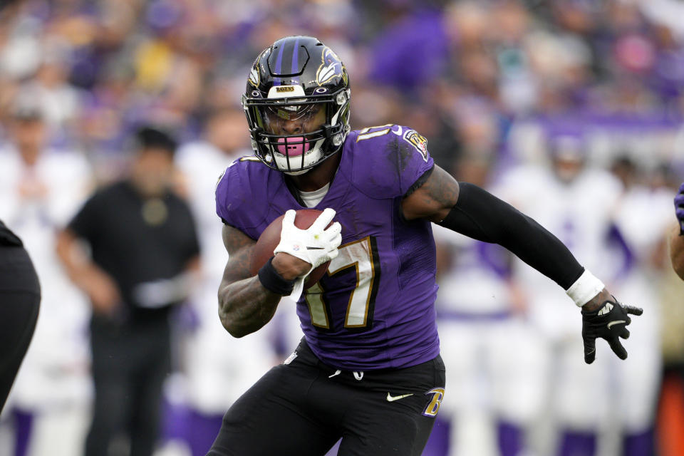 Baltimore Ravens running back Le'Veon Bell (17) runs with the ball during the second half of an NFL football game against the Minnesota Vikings, Sunday, Nov. 7, 2021, in Baltimore. (AP Photo/Nick Wass)