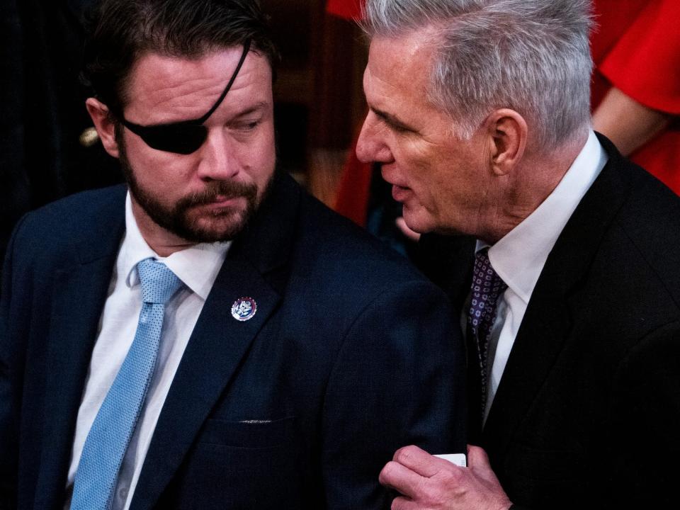 House Republican Leader Kevin McCarthy, R-Calif., right, and Rep. Dan Crenshaw, R-Texas, are seen on the House floor after a vote in which McCarthy did not receive enough votes to become Speaker of the House on Wednesday, January 4, 2023.