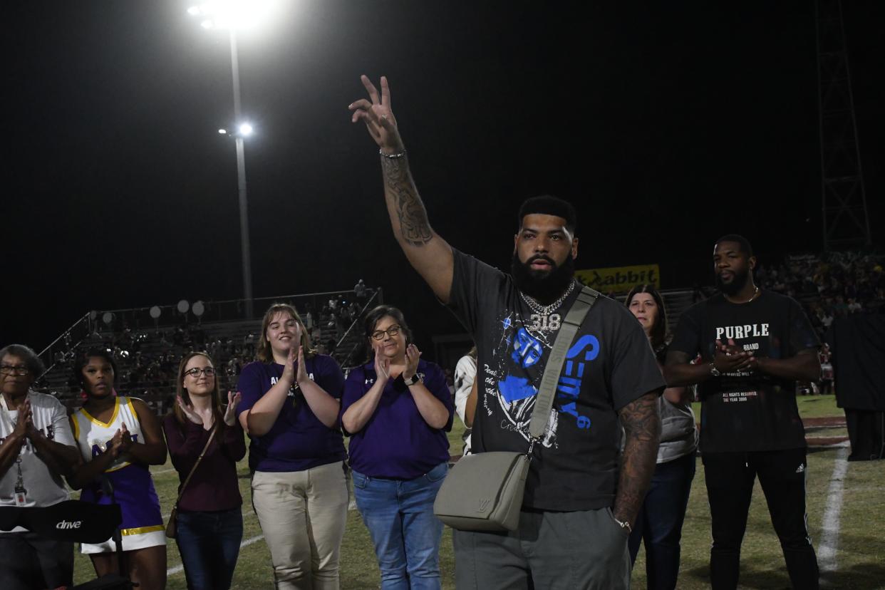 Cincinnati Bengals player Cody Ford and Pineville High School alum was emotional Friday night at the Red River Rivalry between Pineville and Alexandria Senior High School. His PHS jersey number 74 was retired in a ceremony held at halftime.