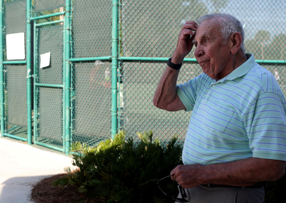 John Buhagiar, 88, originally from Long Island, NY, talks about his voting preferences as retirees play pickleball amidst coronavirus-related event cancellations at Fenney Recreation Center in The Villages, Florida, U.S., ahead of the upcoming Democratic primary, March 15, 2020.  REUTERS/Yana Paskova