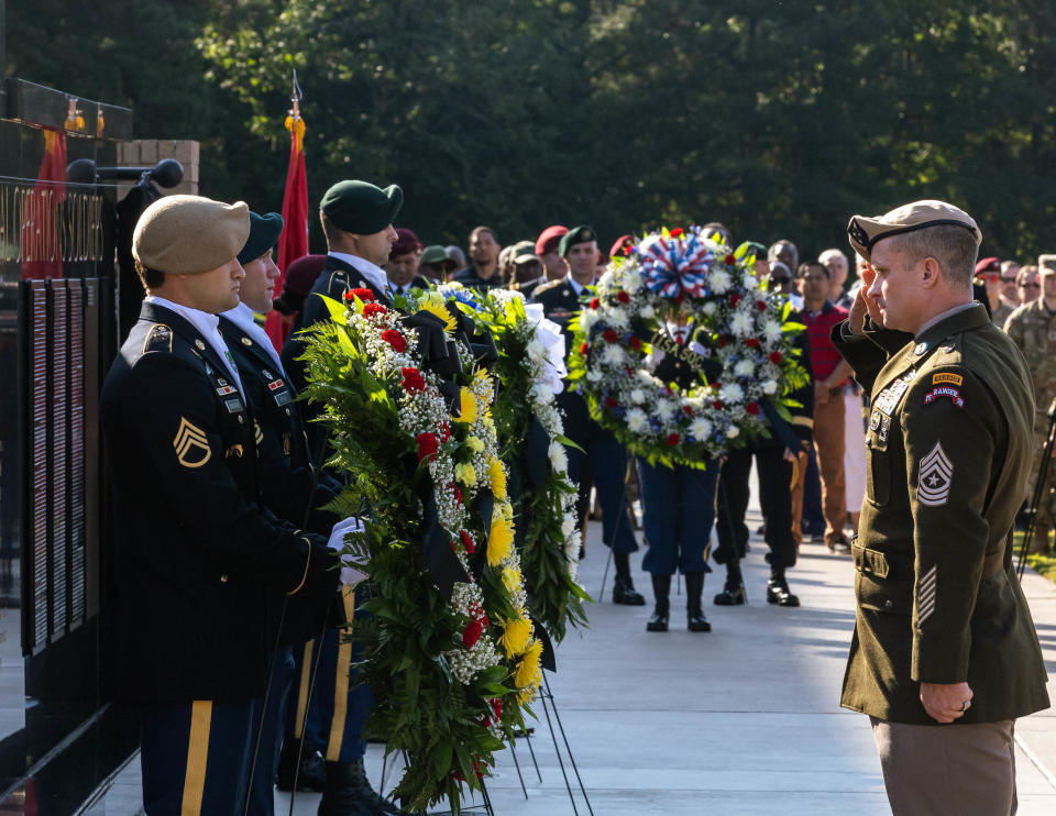 Command Sgt. Maj. Brett Johnson, of the 75th Ranger Regiment, salutes during the U.S. Army Special Operations Command's memorial ceremony Thursday, May 23, 2024, at Fort Liberty.