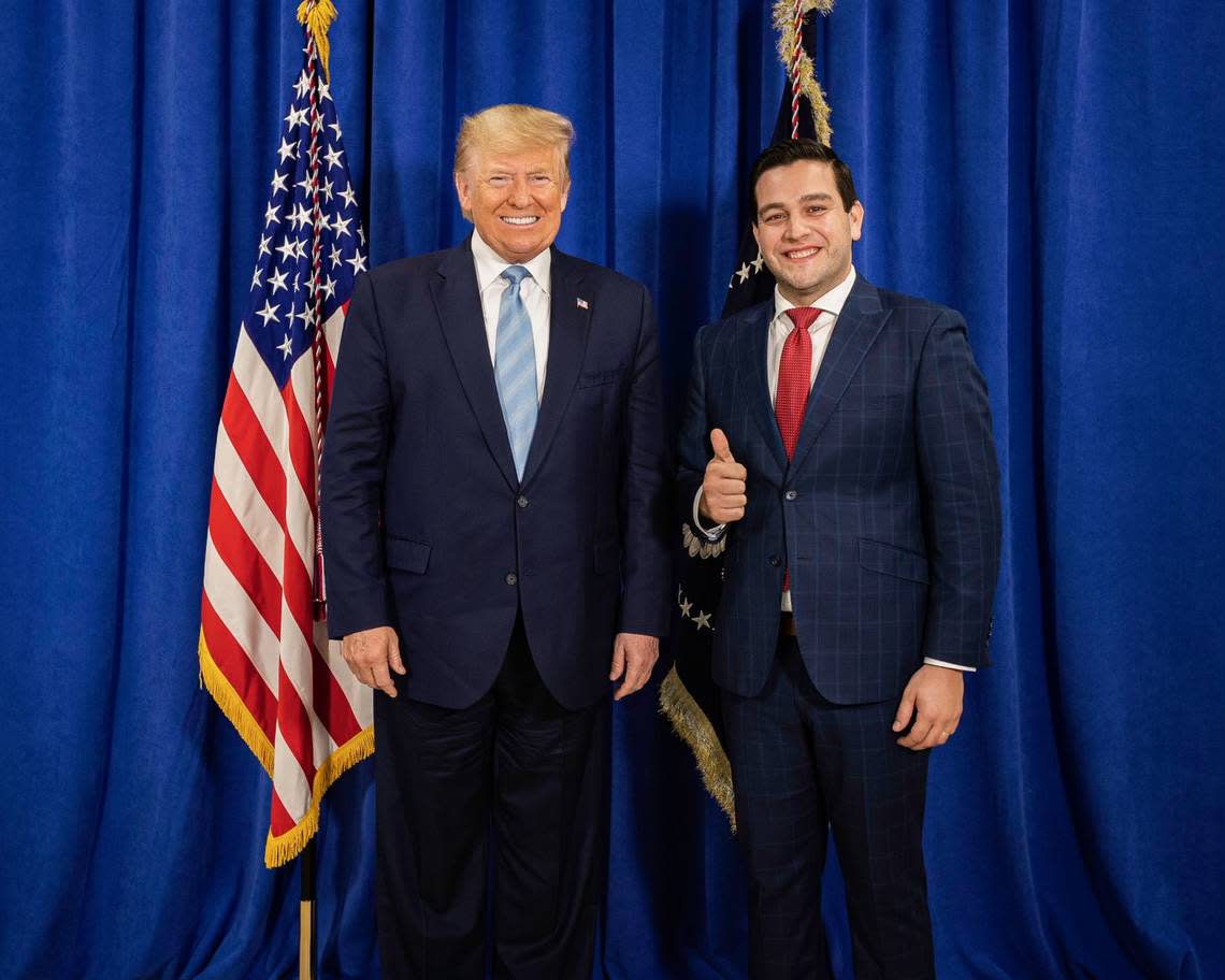 Donald Trump poses with Kevin Cabrera, director of the former president’s 2020 Florida campaign, in an undated photo. Trump endorsed Cabrera in the Aug. 23, 2022 race for the District 6 seat for the Miami-Dade County Commission.