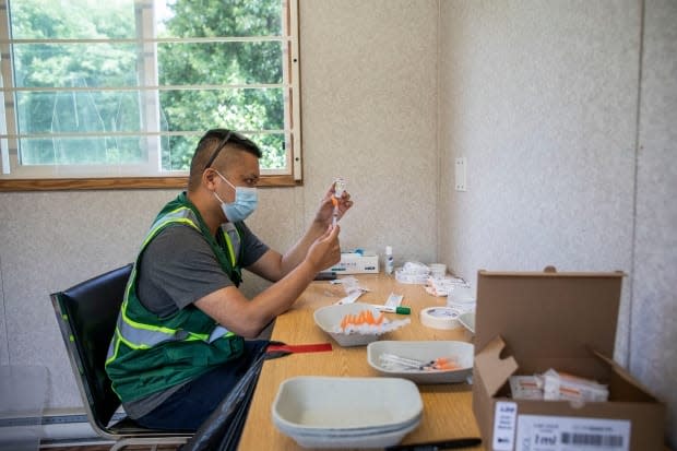 A COVID-19 vaccination clinic for commercial truck drivers off Highway 91 in North Delta, British Columbia on Wednesday June 16, 2021. (Ben Nelms/CBC - image credit)