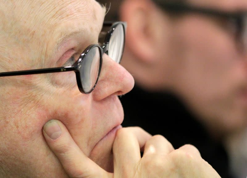 FILE PHOTO: Swedish-born artist Oldenburg listens during a news conference in Vienna